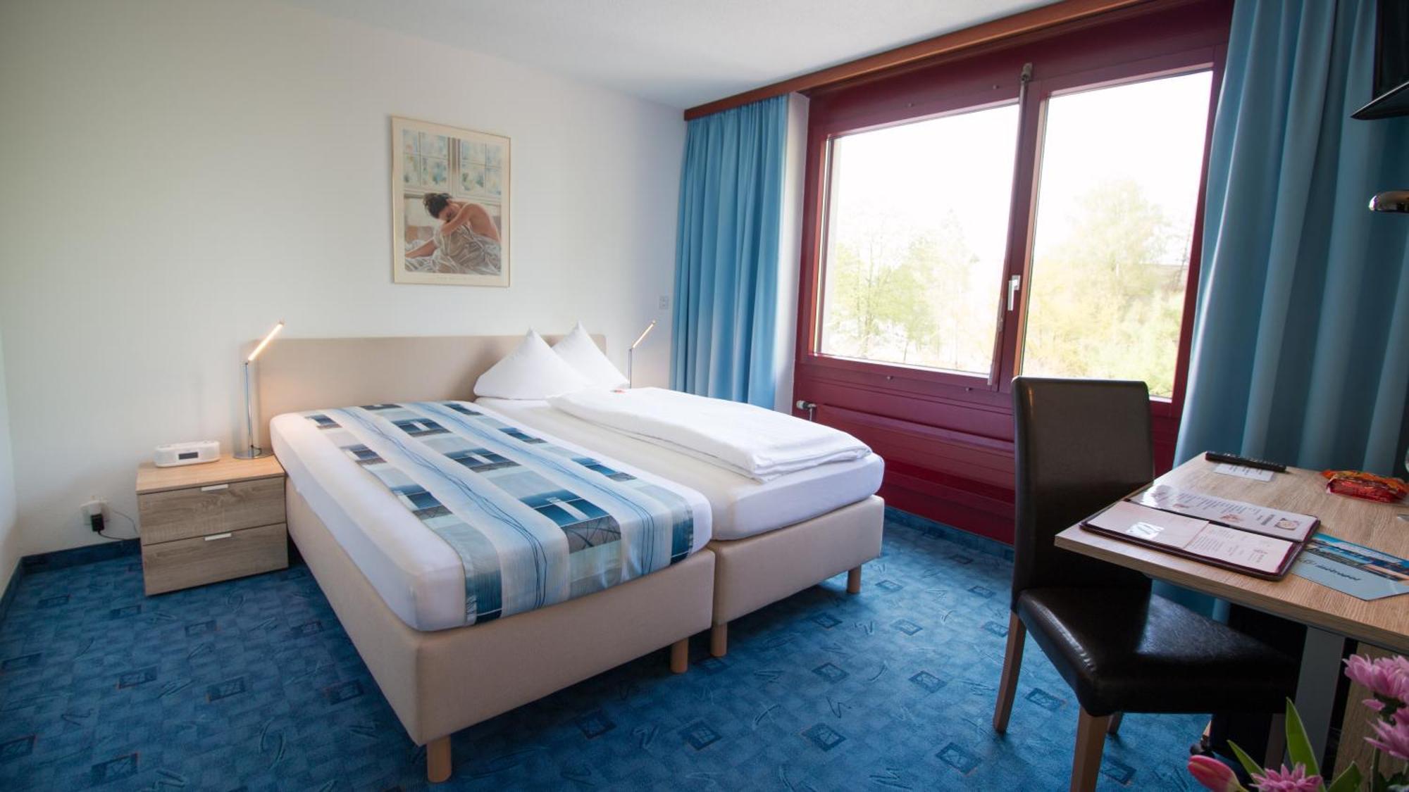 Park - Hotel Inseli Romanshorn Pokoj fotografie